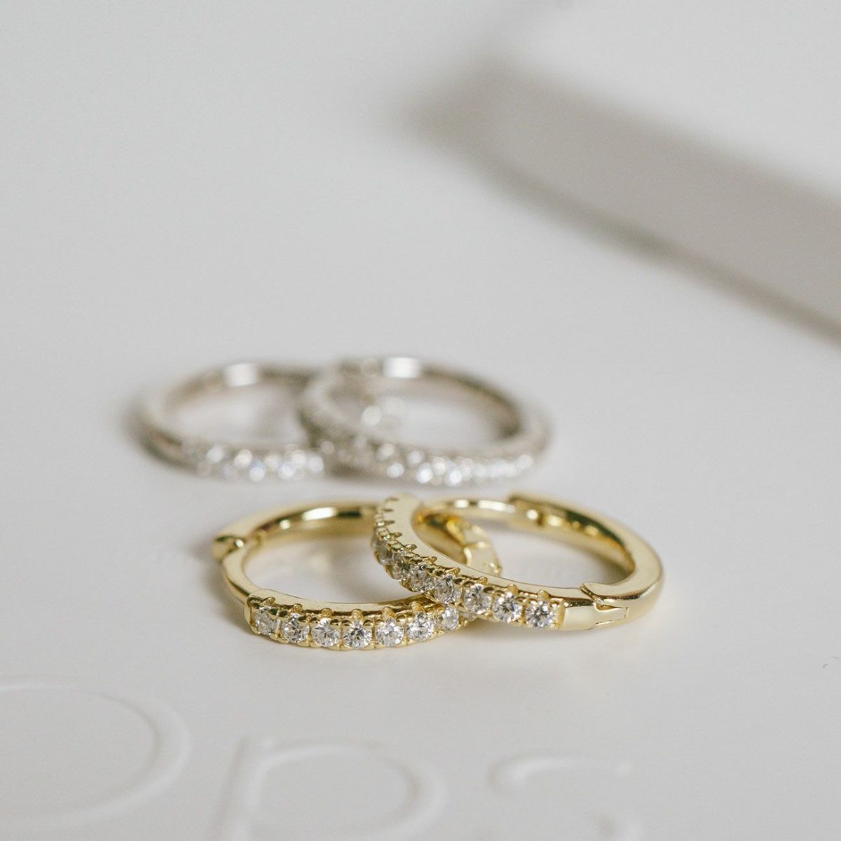 KYKLOS-STR CV PAVE HOOP PIERCE 1